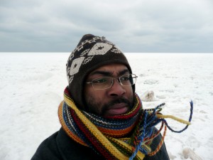 Self-portrait with wind and ice on the shore of Lake Michigan near Holland, MI.